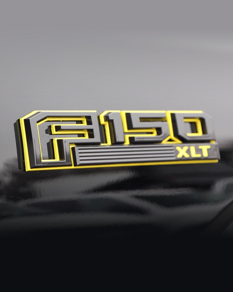 Custom Black & Yellow Emblems at All American Auto Group in Old Bridge NJ