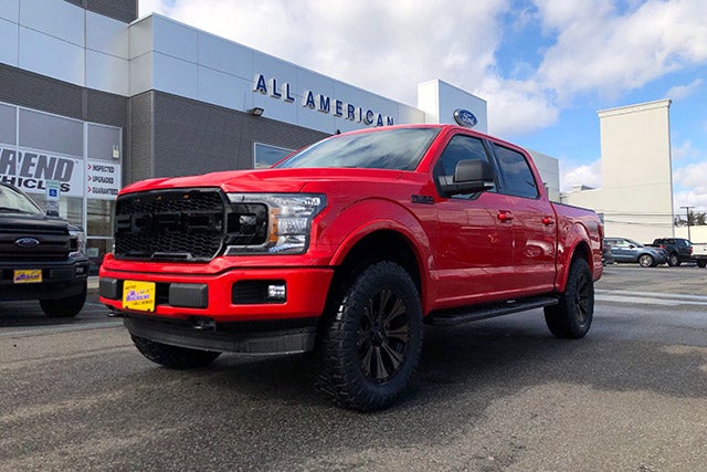 Custom Red Lifted Truck at All American Auto Group in Old Bridge NJ